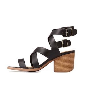 black caged open toe sandal with side buckles